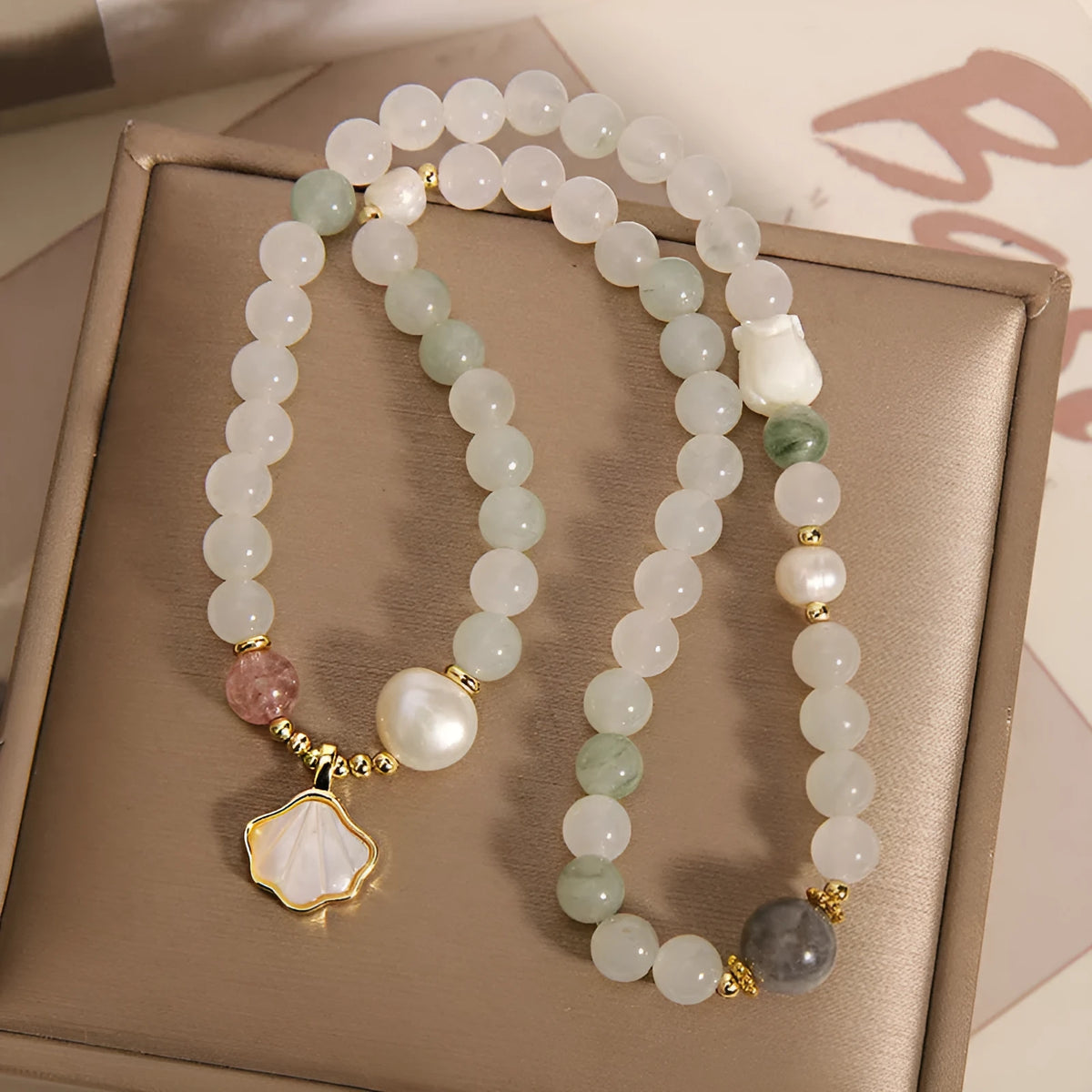 Women's crystal bracelet with Tianshan Jade ginkgo leaf pendant and gold-plated gemstone decoration