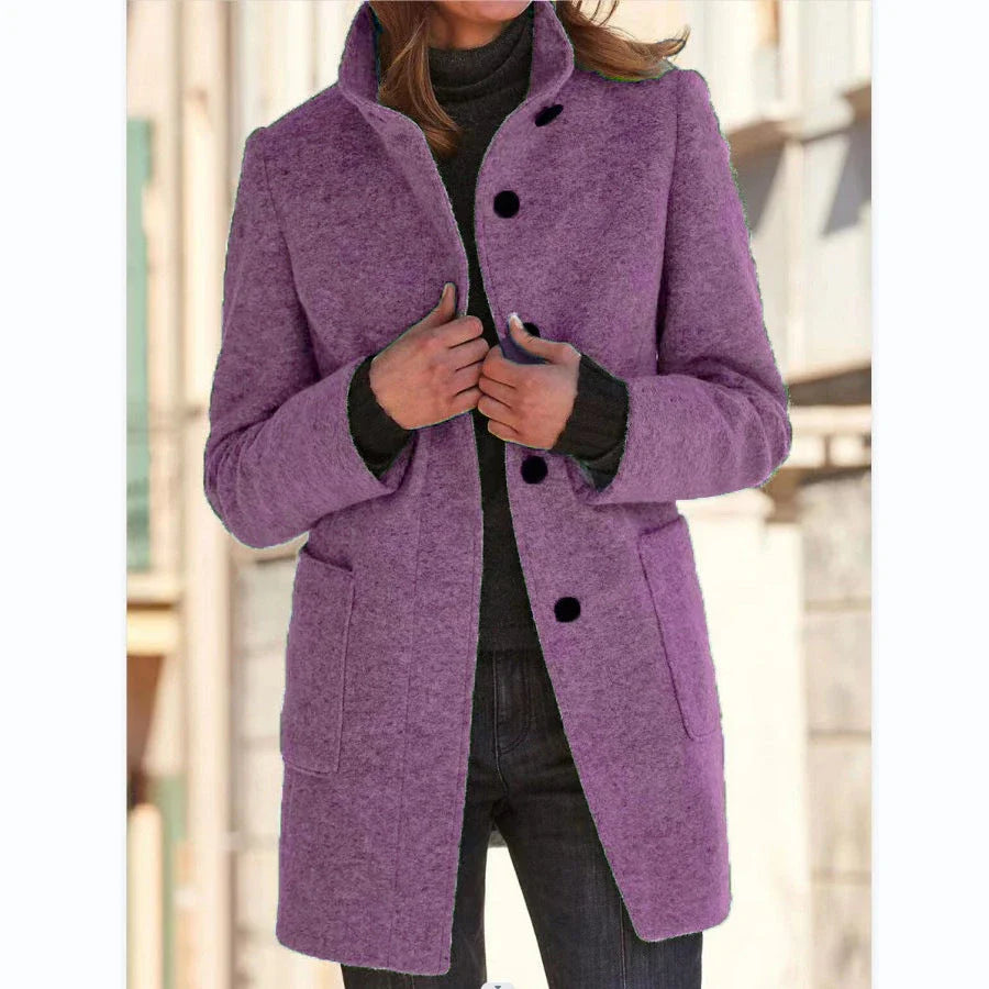 Stylish wool coat with stand collar, pockets, and slim fit design for casual winter wear.