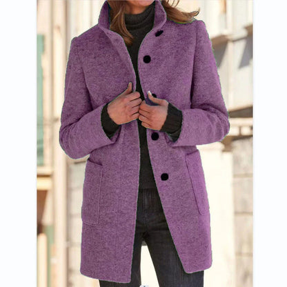 Stylish wool coat with stand collar, pockets, and slim fit design for casual winter wear.