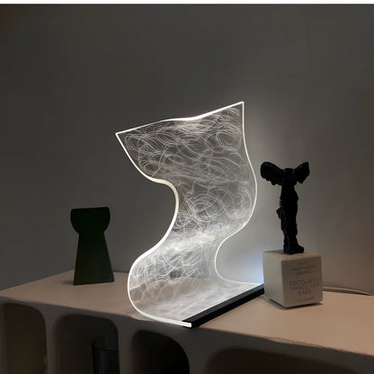 USB-powered bedside lamp with three colour settings and compact design