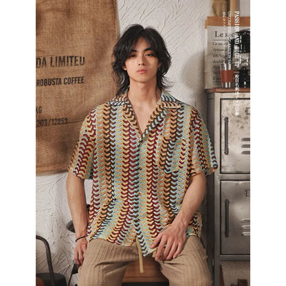 Grey plus-size men's Cuban collar shirt with a textured hollow jacquard print and short sleeves.