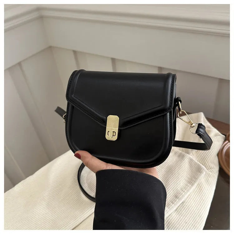Soft PU leather messenger bag with textured finish in horizontal rectangular shape