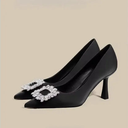 Women's pointed toe stiletto high heels in beige and black colours with low top design