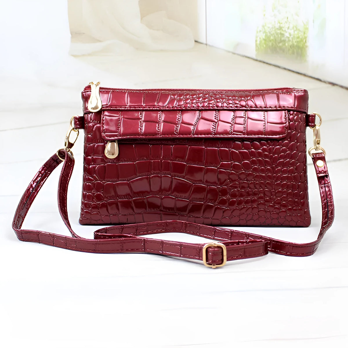 Women's black soft PU leather messenger bag with shoulder strap and square design