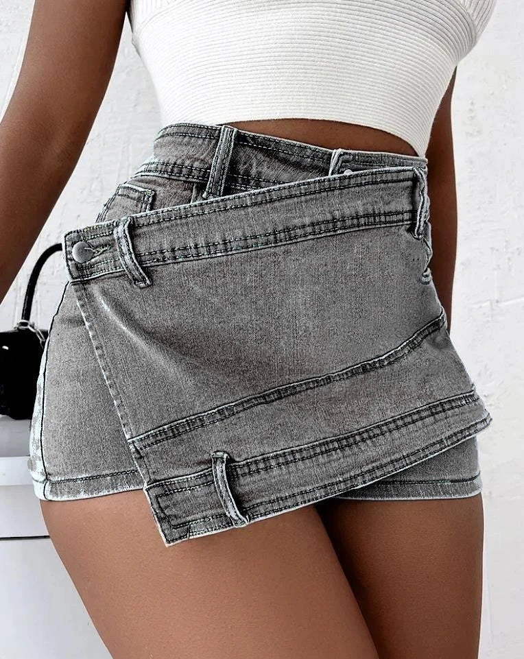 Stylish Y2K denim shorts with asymmetrical hem, available in dark blue, light blue, grey, and black colors in sizes S-5XL