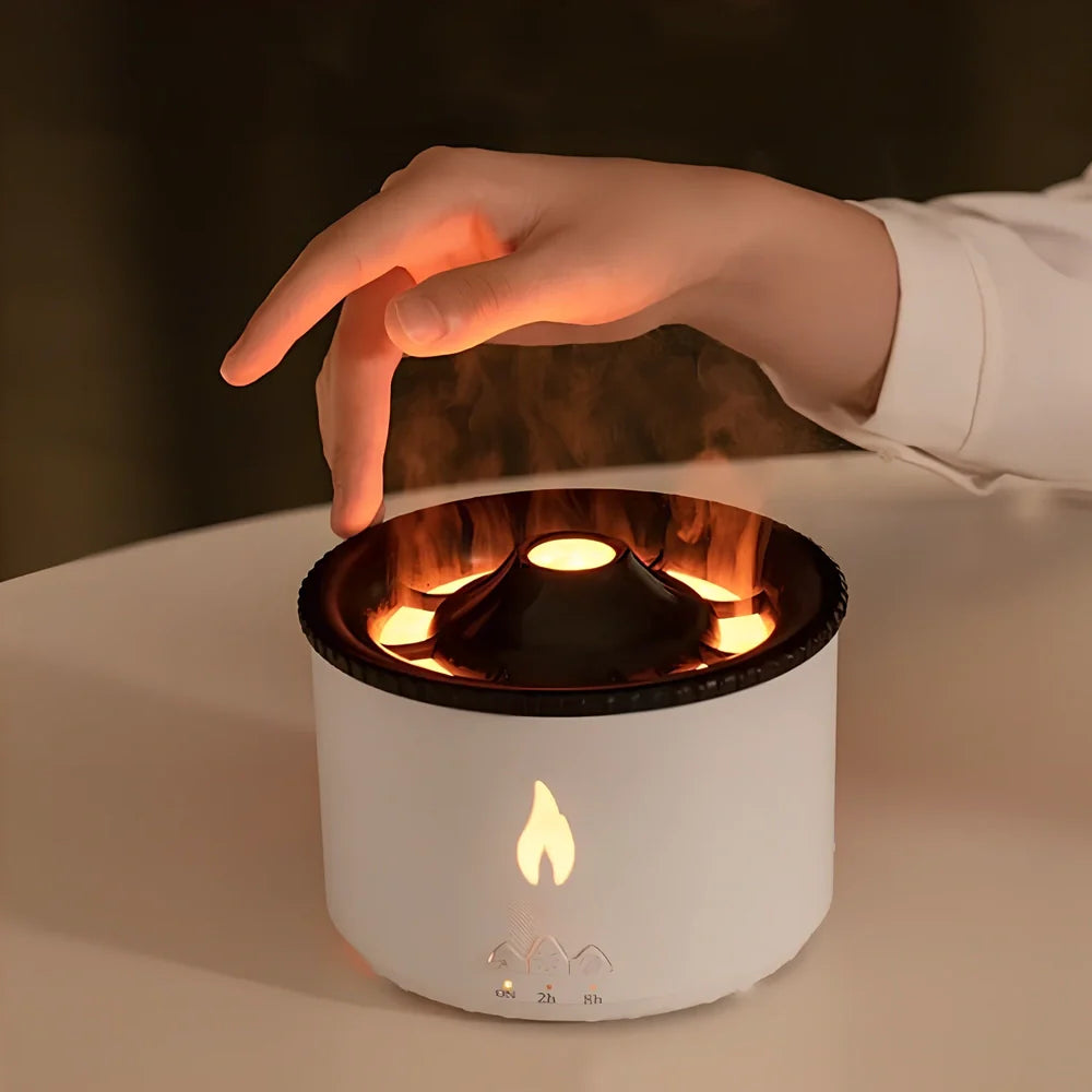 Black columnar ultrasonic humidifier with volcano flame effect and jellyfish smoke rings emerging from mist
