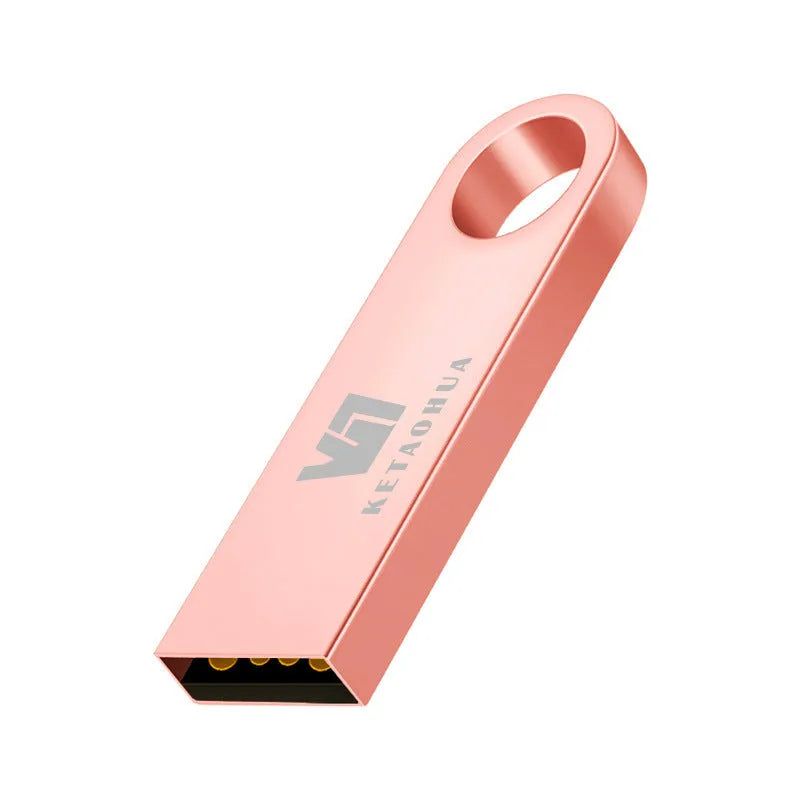 Custom silver metal car-shaped USB flash drive on a white background