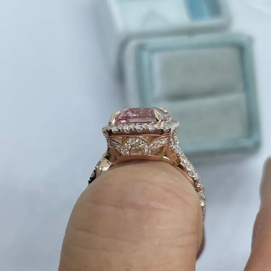 Rose gold geometric alloy ring showing electroplated finish and structured shape.