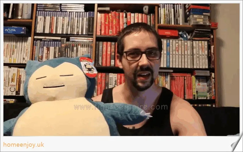 Snorlax Anime Plush Toy - A soft, cuddly Pokémon figure with a charming expression and vibrant colours