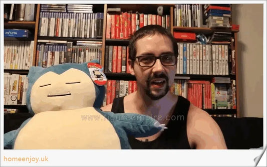 Snorlax Anime Plush Toy - A soft, cuddly Pokémon figure with a charming expression and vibrant colours