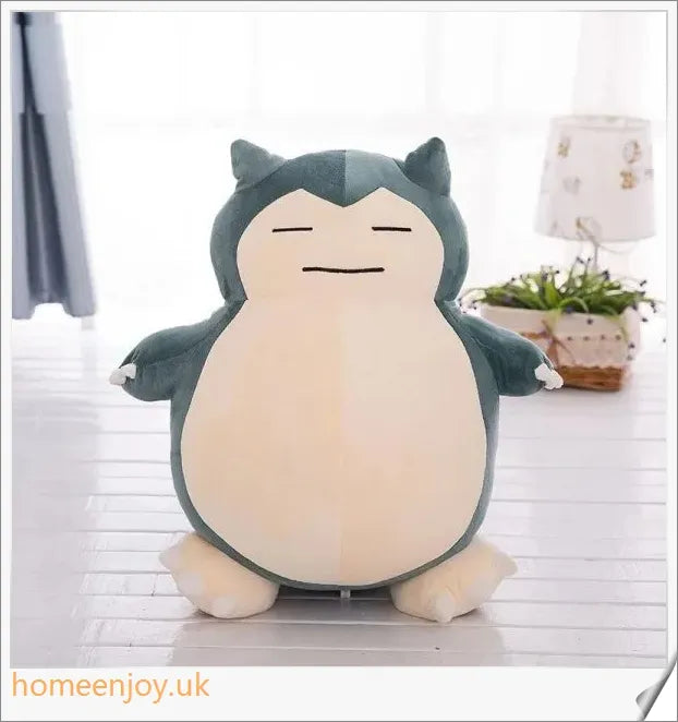 Snorlax Anime Plush Toy - A soft, cuddly Pokémon figure with a charming expression and vibrant colours