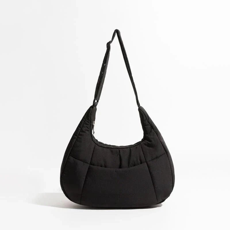 Chic Half Moon Puffer Shoulder Bag in Pink - Unique quilted design, secure zipper closure, and adjustable strap for everyday elegance