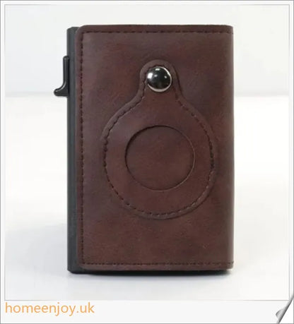 Premium genuine leather and aluminium wallet with built-in AirTag pocket and RFID-blocking technology for secure everyday carry