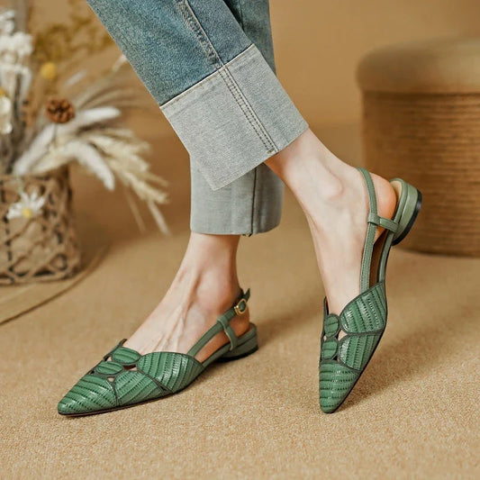 Chic pointed toe slingback sandals in khaki colour, featuring a low square heel and elegant leather design.