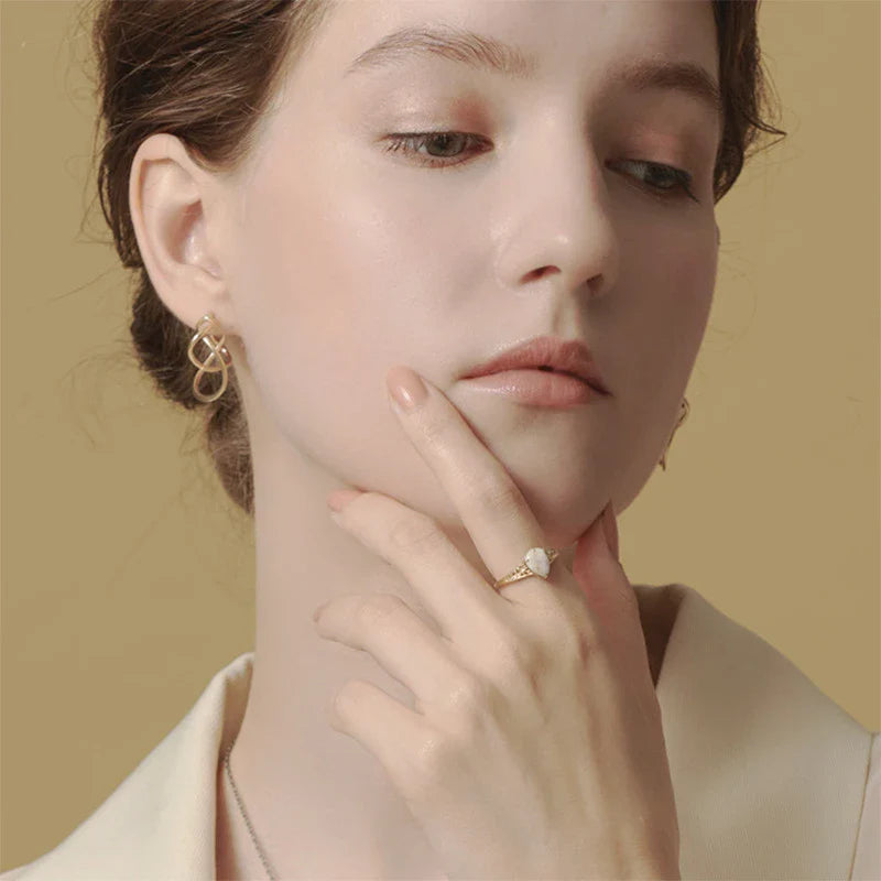 Antique sterling silver gold-plated ring with intricate vintage-inspired design
