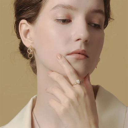 Antique sterling silver gold-plated ring with intricate vintage-inspired design