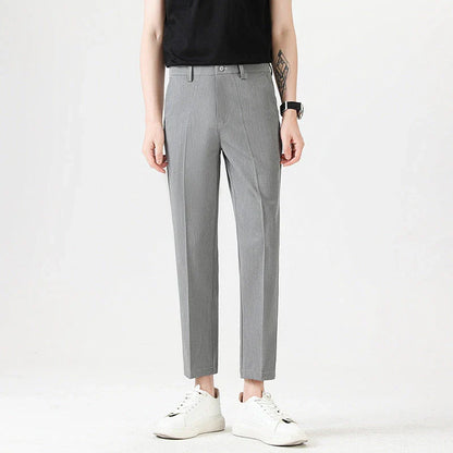 Light Luxury Men's Casual Small Trousers in various colours and sizes, featuring a stretch, pencil-leg design for a tailored, refined look.