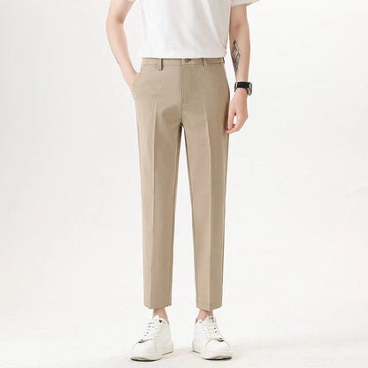 Light Luxury Men's Casual Small Trousers in various colours and sizes, featuring a stretch, pencil-leg design for a tailored, refined look.