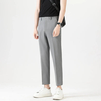 Light Luxury Men's Casual Small Trousers in various colours and sizes, featuring a stretch, pencil-leg design for a tailored, refined look.