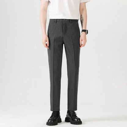 Light Luxury Men's Casual Small Trousers in various colours and sizes, featuring a stretch, pencil-leg design for a tailored, refined look.