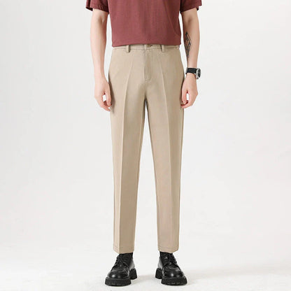 Light Luxury Men's Casual Small Trousers in various colours and sizes, featuring a stretch, pencil-leg design for a tailored, refined look.