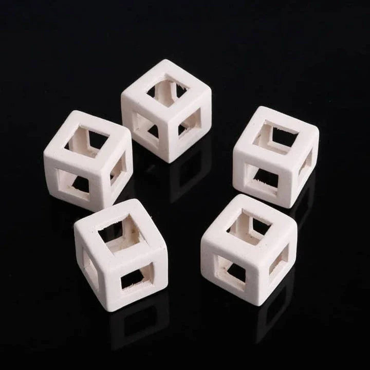 Elegant ceramic cube-shaped aquarium decor, designed to elevate the beauty and ambiance of your underwater oasis