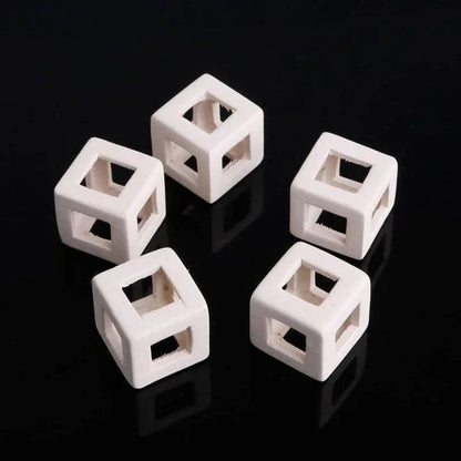 Elegant ceramic cube-shaped aquarium decor, designed to elevate the beauty and ambiance of your underwater oasis