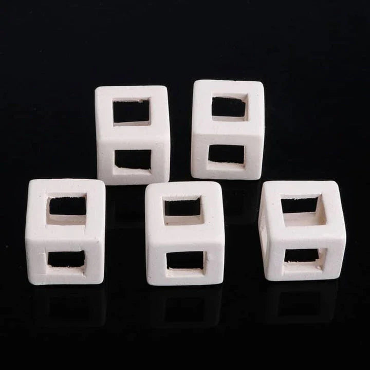 Elegant ceramic cube-shaped aquarium decor, designed to elevate the beauty and ambiance of your underwater oasis