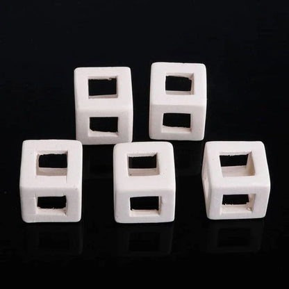 Elegant ceramic cube-shaped aquarium decor, designed to elevate the beauty and ambiance of your underwater oasis