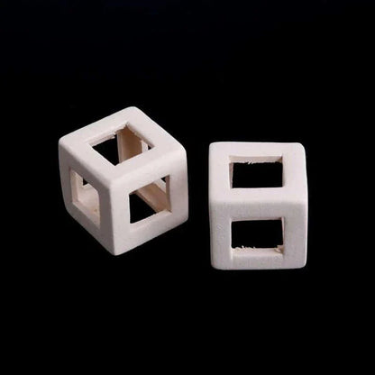 Elegant ceramic cube-shaped aquarium decor, designed to elevate the beauty and ambiance of your underwater oasis