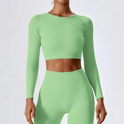 A stylish and comfortable women's ribbed long sleeve yoga crop top in Tiffany Blue colour
