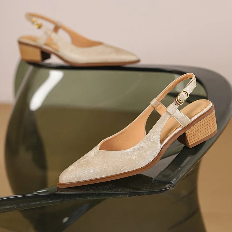 Elegant and comfortable slingback leather pumps in a stylish green colour