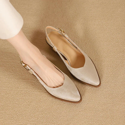 Elegant and comfortable slingback leather pumps in a stylish green colour