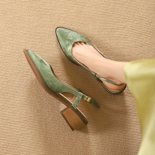 Elegant and comfortable slingback leather pumps in a stylish green colour