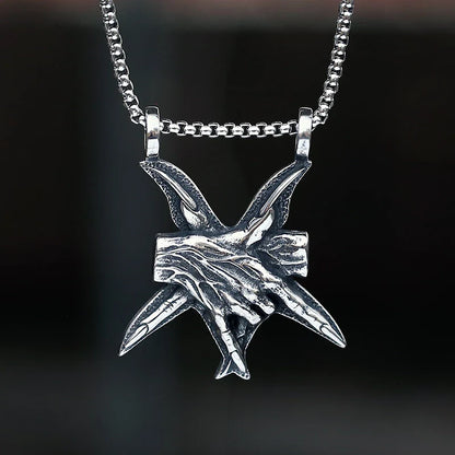 A close-up view of a three-dimensional pendant necklace made of titanium steel, showcasing its sleek and sophisticated design.