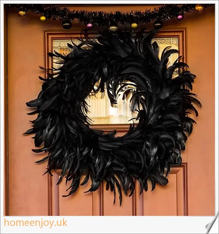 Black Halloween wreath made of luxurious natural feathers in shades of onyx, green, and purple