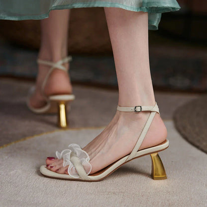 Elegant square toe high heel sandals made with genuine leather and a unique buckle design
