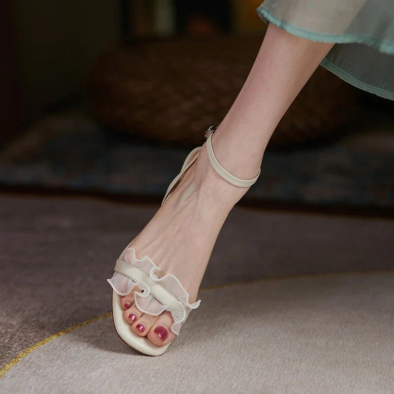 Elegant square toe high heel sandals made with genuine leather and a unique buckle design