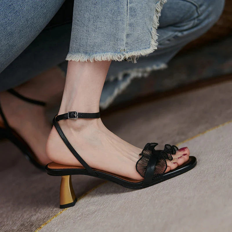 Elegant square toe high heel sandals made with genuine leather and a unique buckle design