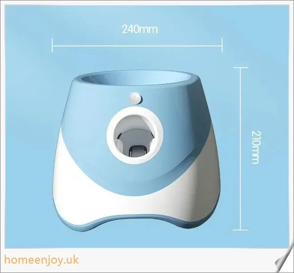 Automatic dog ball launcher toy in blue colour, with three tennis balls and a charging cable