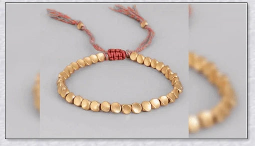 Handcrafted Tibetan copper bead bracelet with adjustable length and positive energy