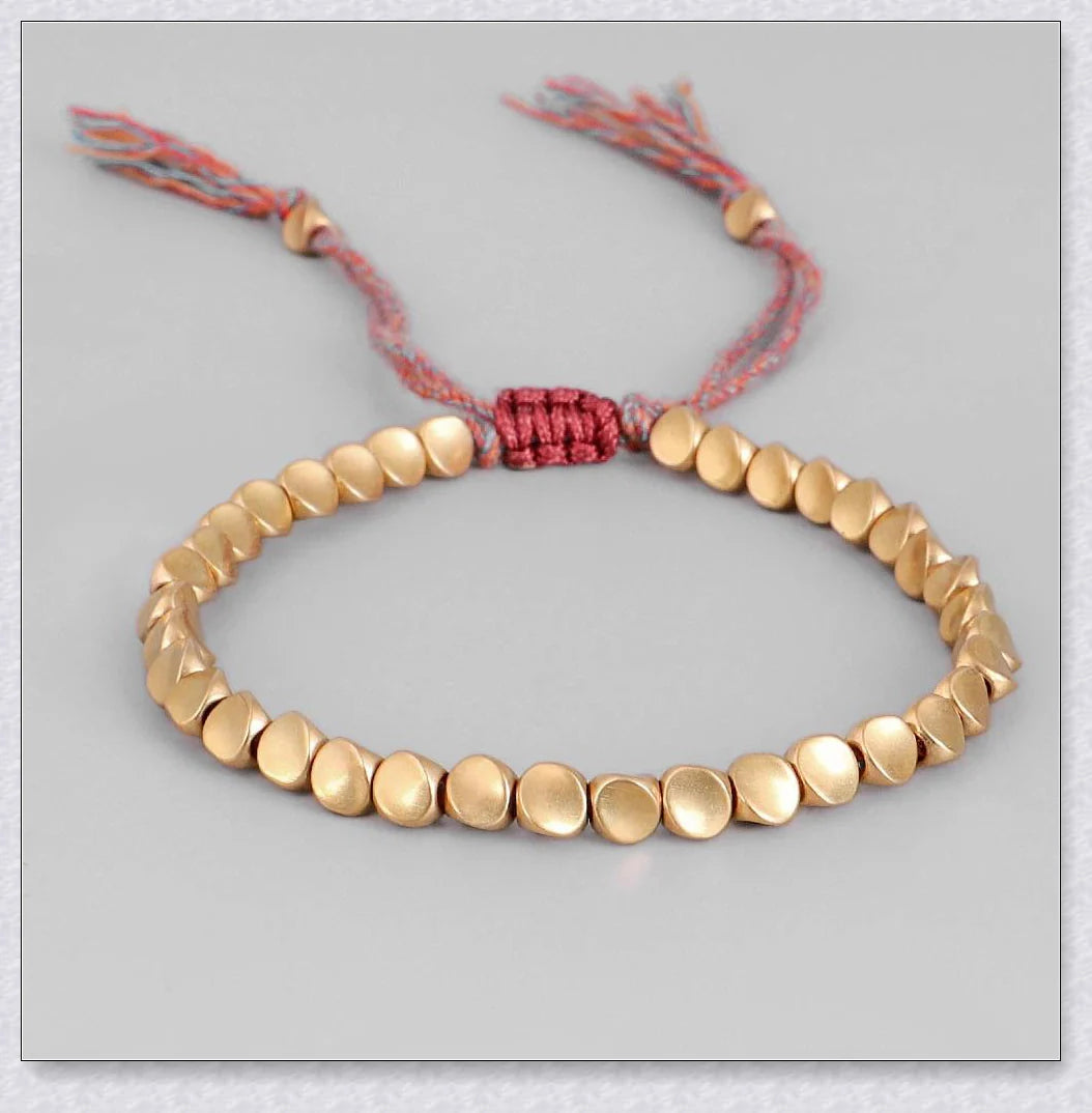 Handcrafted Tibetan copper bead bracelet with adjustable length and positive energy