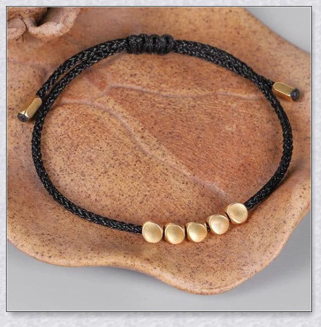 Handcrafted Tibetan copper bead bracelet with adjustable length and positive energy