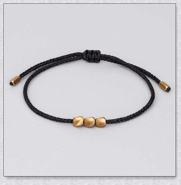 Handcrafted Tibetan copper bead bracelet with adjustable length and positive energy