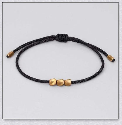 Handcrafted Tibetan copper bead bracelet with adjustable length and positive energy