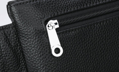 A stylish and durable men's leather chest bag with a positive dragon design, perfect for active urban lifestyles.