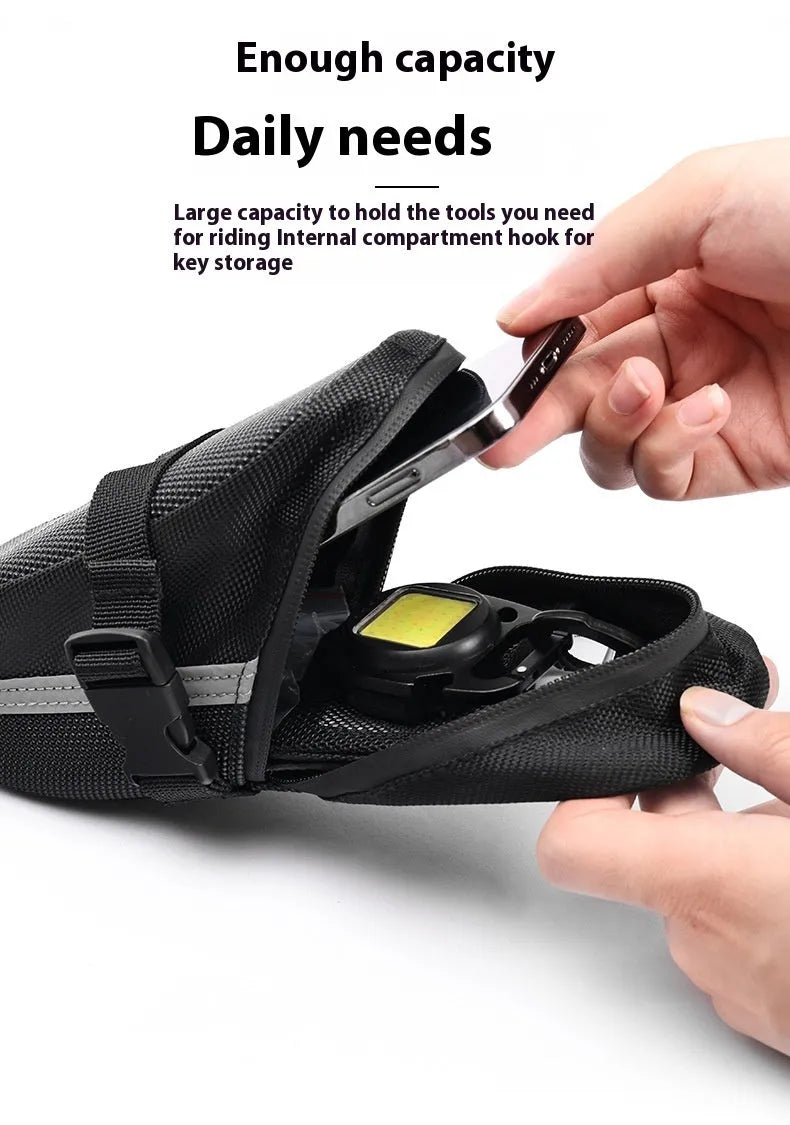 Black cycling saddle bag with quick-release mount showing 20x8x6cm dimensions on bicycle