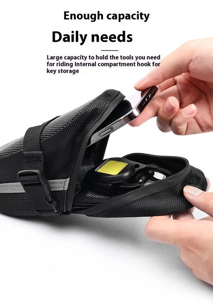Black cycling saddle bag with quick-release mount showing 20x8x6cm dimensions on bicycle