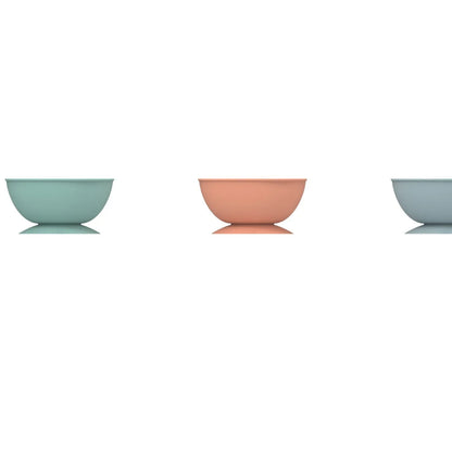 Cyan silicone slow feeding bowl for dogs with textured surface and suction cup base, 15.8cm diameter