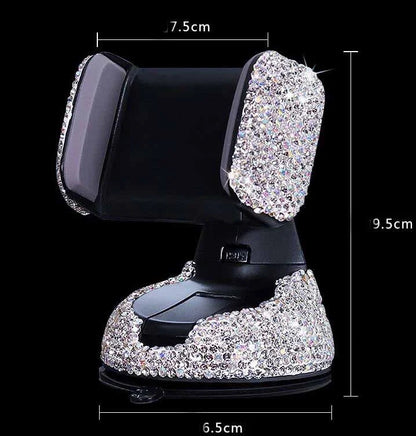 Diamond-encrusted car phone holder mounted on air vent with smartphone securely attached